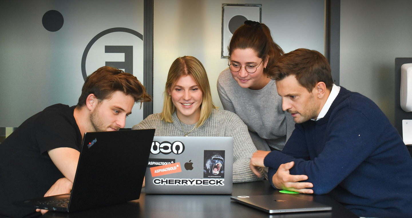 Developers collaborating around a table