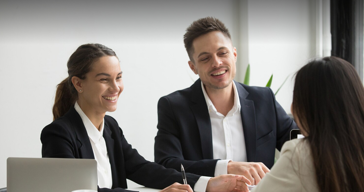 Professionals collaborating in a meeting